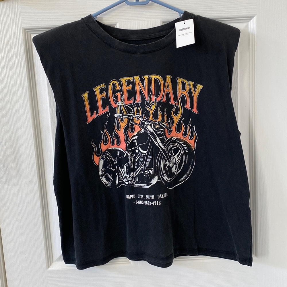 new w tags from cotton on . has shoulder pads  & no back design.